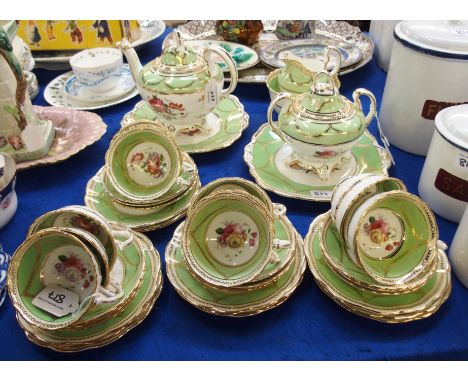 An Allertons bone china teaset, decorated with a bouquet of flowers on a green, white and gilt ground comprising; teapot, 20.