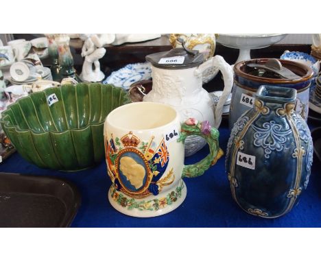 A Doulton stoneware tobacco jar (def) a Doulton Lambeth vase, a Cobridge parian jug decorated with the arms of Great Britain,