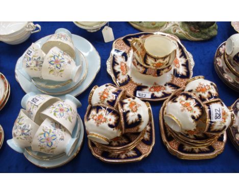 A Royal Albert 'Royalty' pattern teaset comprising; six cups, six saucers, eight plates, milk jug, sugar bowl and cake plate 