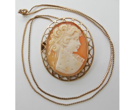 A 9ct gold cameo pendant brooch dimensions 4.3cm x 3.6cm with a 9ct gold snake chain, Length 50cm. Weight approx 13.7gms Cond