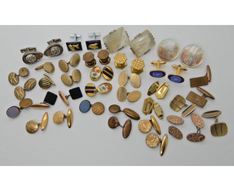 A collection of vintage cufflinks to include gold plated Deco examples Condition Report: Available upon request