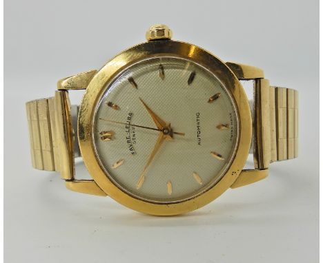 An 18ct gold gents Favre Leuba Automatic watch head with expandable gold plated strap. The cream textured dial with chevron b