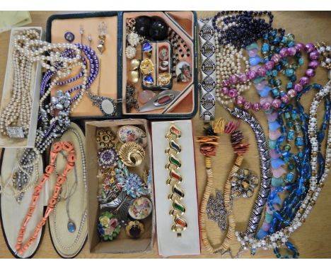 A box full of vintage silver and costume jewellery Condition Report: Available upon request