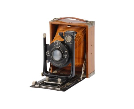 A Contessa-Nettel Tropical Andro Camera,1921, 9x12cm, teak, with Carl Zeis Jena Tessar f/4.5 135 lens, black, serial no. 4481