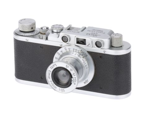 A Leica II Rangefinder Camera,1938, chrome, serial no. 306395, with Leitz Elmar f/3.5 50mm lens, 1938, chrome, serial no. 438
