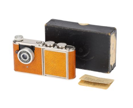 A Kunik Walter Petie Vanity Brown Leather Camera,1956, 16mm subminiature, complete with powder compact, lipstick holder (empt