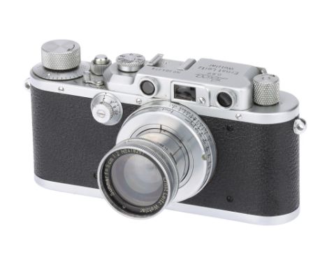 A Leica III Rangefinder Camera,1938, chrome, serial no. 304276, with Leitz Summar f/2 50mm lens, 1938, chrome, serial no. 418