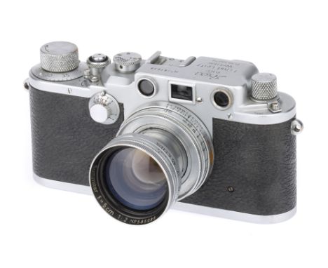 A Leica IIIc 'Luftwaffen-Eigentum' Rangefinder Camera,1941/42, chrome, serial no. 381638, with Leitz Summitar f/2 50mm lens, 