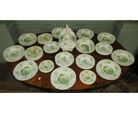An extensive sixty-one piece early nineteenth century green and white transfer-printed Brameld Don Quixote dinner service, c.