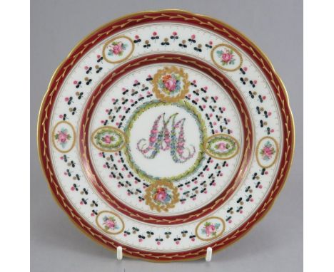A nineteenth century superb quality hand-painted German Carl Magnus Hohenberg porcelain plate with raised gilding and a centr