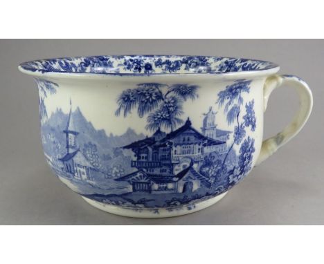 A mid-nineteenth century blue and white transfer-printed Minton Genevese pattern camber pot, c. 1840. It is marked to the und