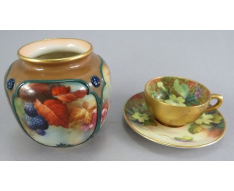 An early twentieth century Royal Worcester squat vase painted with blackberries together with a small cup and saucer painted 