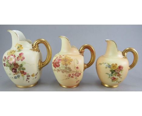 A group of early twentieth century Royal Worcester blush ivory jugs, c. 1910-30. All the same form, but graduated. 13 - 16 cm