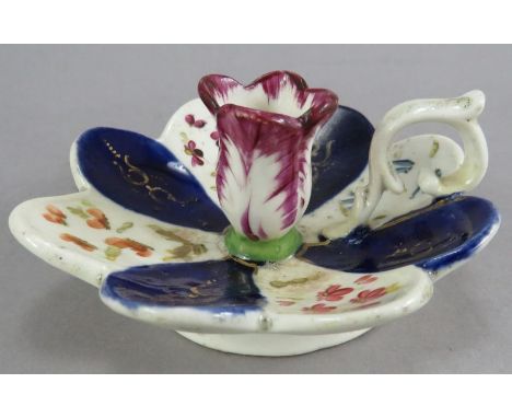 An early nineteenth porcelain hand-painted small-size taper handled stick, c. 1825. It is decorated with floral sprays and gi