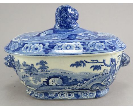 A blue and white transfer-printed Grazing Rabbits pattern sauce tureen and cover, c.1825. It has lion's head handles. 20cm ha