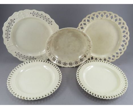 A group of early nineteenth century creamware plates, c. 1820. To include: two basket weave arcaded plates, two further mould