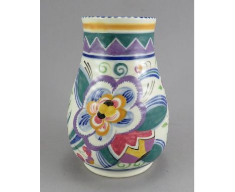 A twentieth century Poole Pottery baluster vase, c. 1930. It is decorated with a floral design by Trida Adams and was painted