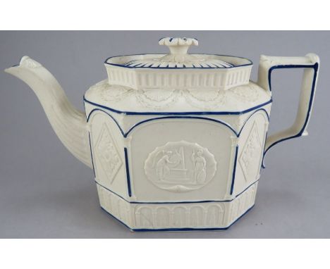 An early nineteenth century feldspathic Castleford-type moulded teapot, c. 1805-10. It has a panel for Trafalgar and a furthe