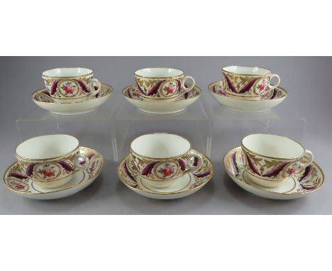 A group of early nineteenth century hand-painted porcelain Minton cups and saucers in the 791 pattern. Each is decorated with