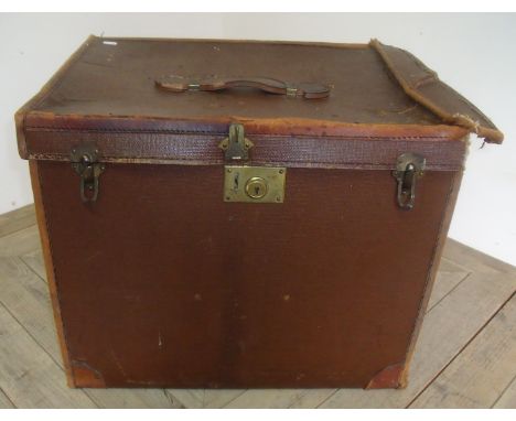 Leather and canvas trunk of square form with leather handle and five wire mesh internal pockets (49cm x 59cm x 45cm)