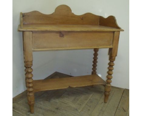 Victorian pine wash stand with raised back and sides with under tier shelf on bobbin turned supports (width 92cm)  