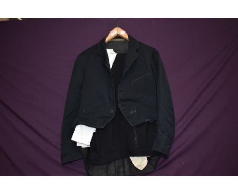 A pair of gents 1940s wool trousers having button fly, a 1960s evening shirt, some staining, also included is a evening jacke