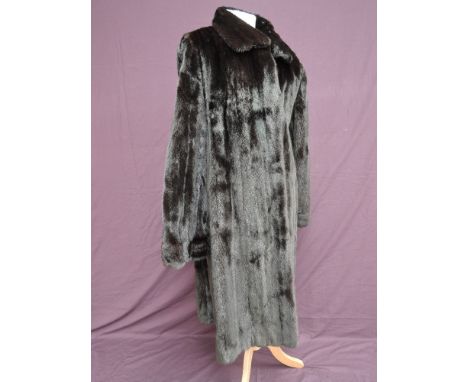 A full length vintage ranch mink fur coat having labels 'kubler' and 'blackglama, world finest ranch mink, great lakes mink a