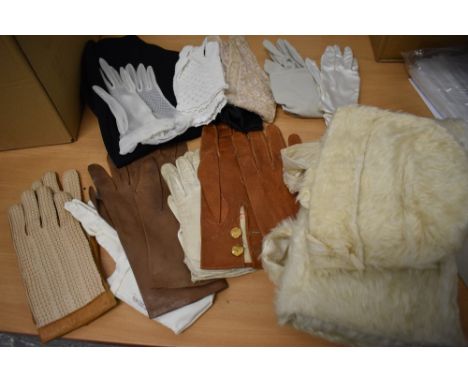 A mixed lot of vintage and antique items to include child's faux fur coat and bonnet, various styles of ladies gloves and a l