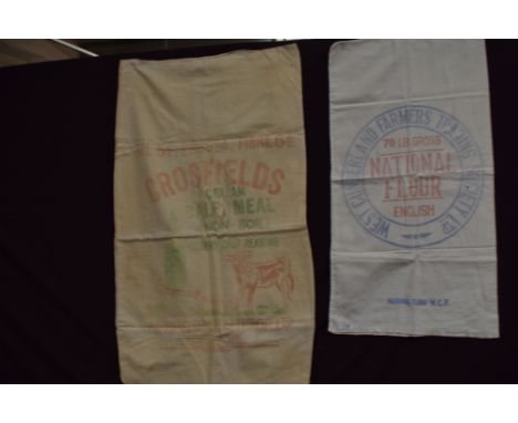 A vintage flour sack and a similar calf meal sack.