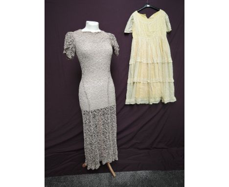 A 1930s coffee coloured lace dress, sheer with puff sleeves and cut on the bias, single button to nape, also included is a ye