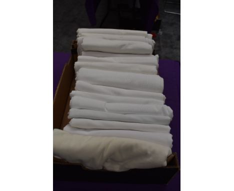 Around fifteen vintage and antique white bed sheets.