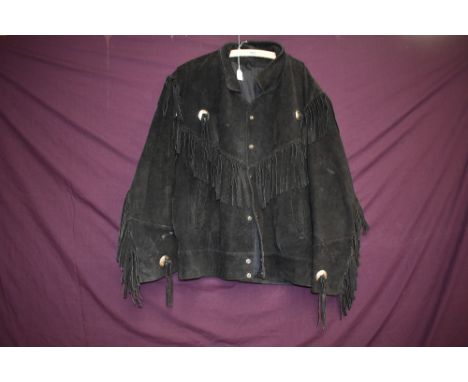A vintage black suede jacket having tassel detailing, larger size.