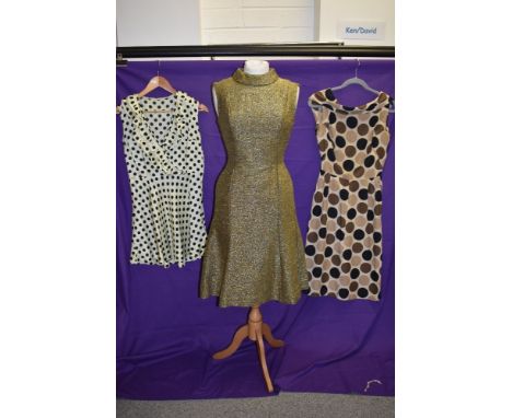 A Trio of vintage dresses to include 1950s silk spotted dress with cowl neck, 1960s metallic thread and wool day dress and 19