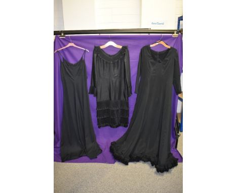 Three vintage 1960s and 1970s black dresses.
overall great condition.