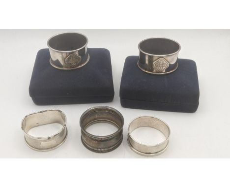 Mixed silver napkin rings to include a pair of 2000 boxed examples, total weight 73.4gLocation:If there is no condition repor
