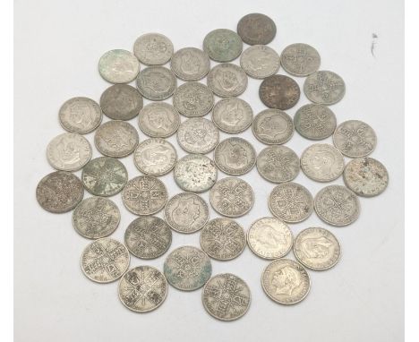 A collection of 1920's/1976 British silver coinage to include two shillings and florins, total weight 502.5gLocation:If there