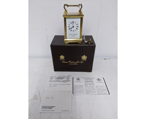 A Charles Frodsham brass cased, five window carriage clock, in original box, with key, guarantee and original receiptLocation