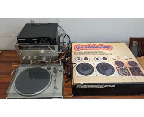 Audio equipment to include a stacking system including a Trio stereo tuner and amplifier, a Technics automatic turntable, a W