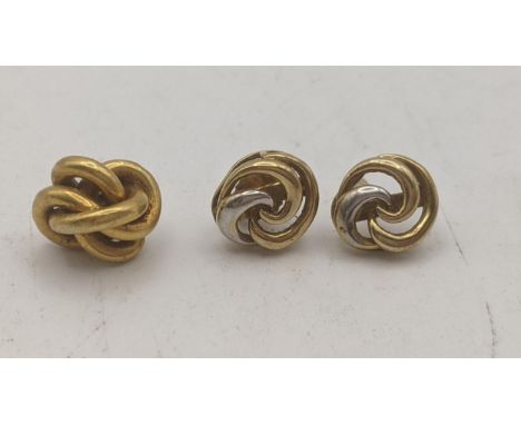 A yellow gold knot style stud earring tested as 18ct gold 2.2g, together with a pair of 9ct gold stud earrings 1.8g Location: