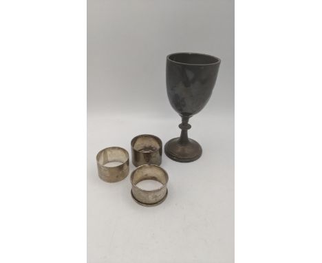 Silver to include a goblet marked to Southgate County School, along with three napkin rings, total weight 128g Location:If th