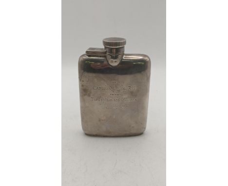 A silver pocket whisky flask engraved to Captain L Hix RN from the Captain and Officers ASWE, 115.4g Location: If there is no
