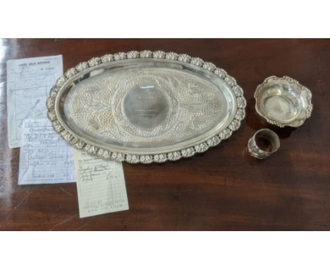 Silver to include floral cast sterling silver napkin ring, along with a floral embossed rim bon bon bowl, 99.4g, together wit