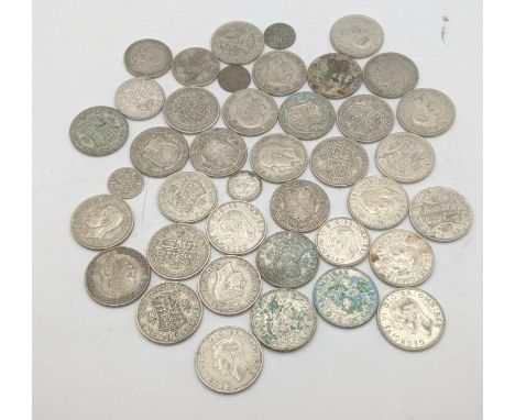 A collection of 1920s/1946 silver British coinage to include half crowns and others, total weight 504.4g Location:If there is