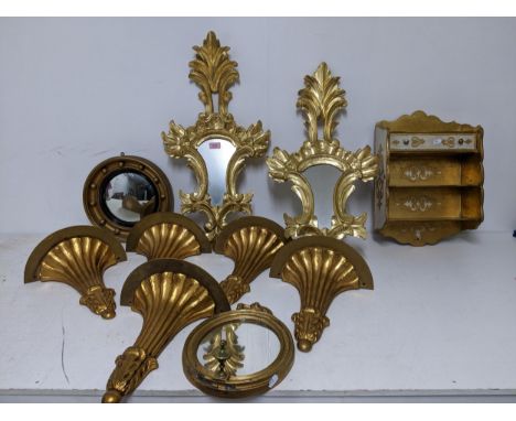 A mixed lot to include a group of five giltwood Corbel wall shelves, wall mirrors to include a small convex butler's mirror, 