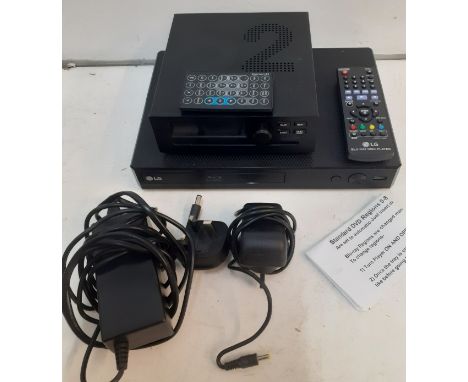 A Brennan B2 480GB hi-fi hard disk CD ripper and recorder with remote control and instructions together with an LG Region fre