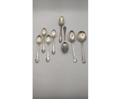A group of eight silver spoons to include a set of four teaspoons, hallmarked Birmingham 1913 and others, total weight 157.9g