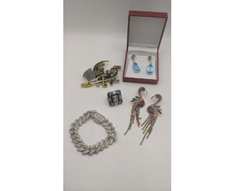 Costume jewellery to include a pair of enamel effect oversized earrings fashioned as flamingo's together with an enamel effec