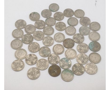 A collection of 1920's/1940 British silver coinage to include florins, total weight 497gLocation:If there is no condition rep