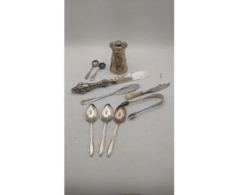 Silver items to include a pepper grinder hallmarked Birmingham 1907, together with a pir of sugar tongs, three silver spoons 