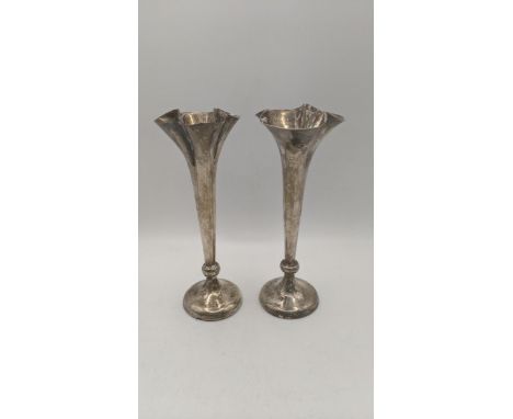 A pair of silver trumpet shaped vases, weighted, hallmarked Birmingham 1905, 16.5cm h Location:If there is no condition repor